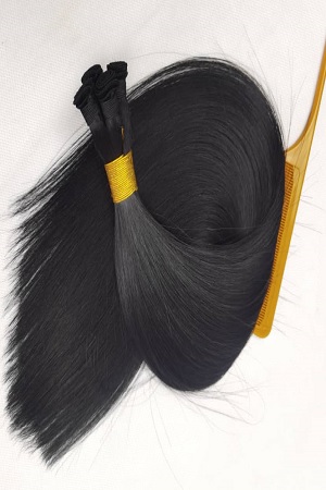 A Tuft of Black Human Hair Extensions