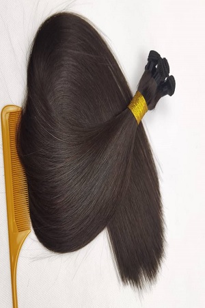 A Tuft of Dark Brown Human Hair Extensions