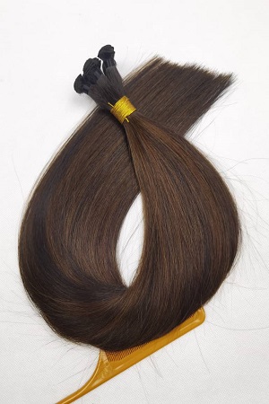 A Tuft of Medium Brown Human Hair Extensions